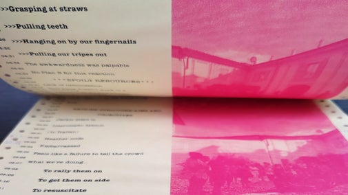 Pages in a stack of old computer paper with text printed in black and images printed in pink monotone on the right half of the page.